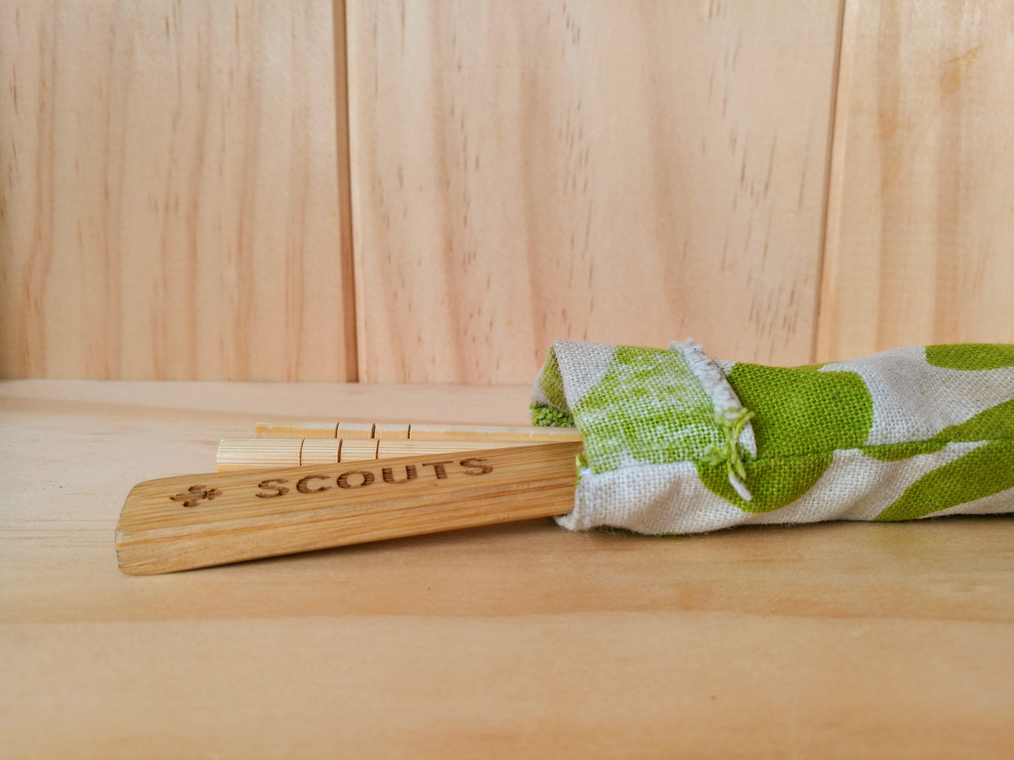 reusable chopsticks and spoon in a cloth bag